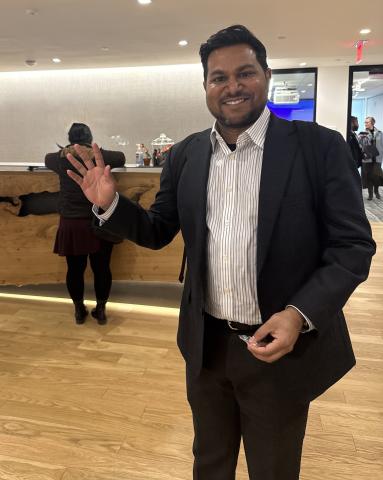 Tariq Thowfeek Waving
